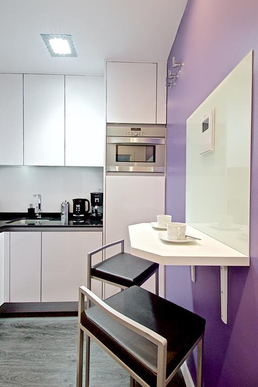 Habitat Apartments Latina Madrid Rum bild